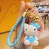 Lindo Llavero de Nudo de Lazo Gato Kt Figura de Resina Hello Kitty Colgante de Cuerda Trenzada Encanto Versátil de Bolsa de Dibujos Animados
