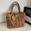 Las Bolsas Grandes de Moda de Este Año para Mujer 2026 Nueva Moda Elegante Bolso de Hombro de Lona Versátil Gran Capacidad Bolso Tote para Viajar