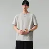 Camiseta de Verano 2026 de Manga Corta y Cuello Redondo Negra Blanca Beige Corte Holgado Con Etiqueta Sin Cuello