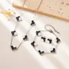 Conjunto Popular de Trébol de Cuatro Hojas Transfronterizo Pulsera y Collar de Acero Inoxidable Joyería de Lujo de Nicho Estilo Europeo y Americano