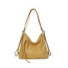 Bolsa de Ombro Retro Relaxada para o Dia a Dia 2026 Nova Mochila Feminina Multiuso Bolsa Transversal de Grande Capacidade