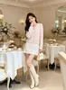 Cárdigan de Punto Rosa Estilo Chanel para Mujer Otoño/Invierno 2026 Pesado Bordado en el Cuello Elegante Abrigo Suéter de Manga Larga Nanyou