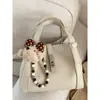 Bolsa de Mão Elegante Estilo Balde para o Dia a Dia de Mulheres 2026 Nova Moda Coreana Retrô de Ombro Único Transversal Bolsa Mãe e Filha