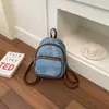 Bolso de mujer elegante y moderno con una textura única, nueva colección 2026, color liso simple, mochila de viaje mini casual y a la moda