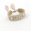 Miles en stock Pulsera de Color Bordada Étnica con Borla de Lazo Correa de Muñeca de Cinta Cuerda de Mano Trenzada Personalizada