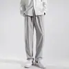 Pantalones de color liso de moda versátiles para hombre, pantalones casuales, pantalones deportivos, moda juvenil, holgados, moda INS, marca de moda