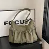 Bolsa de Ombro Versátil Plissada com Cordão e Múltiplos Bolsos Transfronteiriça Novo Modelo 2026 Cor Sólida Casual Texturizada Bolsa Transversal para Mulheres
