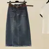 692 Falda vaquera vintage en stock con cinturón, Sin devoluciones ni cambios