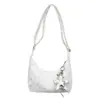 Bolsa feminina de grande capacidade 2026 nova tendência de alto valor elegante pequena bolsa de mão para trabalho e deslocamento, bolsa de ombro e transversal com padrão de estrelas