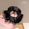 Goma para el pelo de satén dulce estilo coreano para mujer, tacto de alta gama, cuerda de goma para el pelo de cristal, cuerda para el pelo, diseño de nicho pequeño, anillo de intestino, accesorios para el pelo