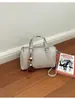 Bolsa de mão retrô de alta costura transfronteiriça, bolsa almofada para mulheres, nova bolsa Boston casual e estilosa, de ombro e transversal, moderna