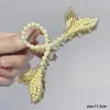 Pinza de Tiburón de Aleación Estilo Coreano Fresca y Dulce con Perlas Cola de Pez para la Parte Posterior de la Cabeza, Accesorio para el Cabello Electrochapado de Yiwu 2025