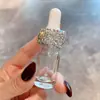 Venda Direta da Fábrica Transfronteiriça Luxo Vidro Transparente Cravejado com Diamantes Frasco Conta-gotas Frasco Vazio para Essência Mini Portátil