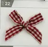 Venta al por mayor del fabricante Cinta a cuadros de 1 cm con lazo Accesorios para ropa Hecho a mano DIY Caja de regalo Lazo para lencería