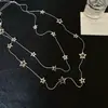 Collar Hueco de Estrella de Cinco Puntas Doble Capa Apilado para Mujer 2025 Nuevo Diseño de Nicho Cadena para Clavícula de Gama Alta