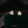 Pendientes de Plata Pura S999 Zirconia Super Brillante Trébol de la Suerte Lujo Accesible Diseño de Alta Gama Pendientes de Diseño de Nicho Venta al por Mayor