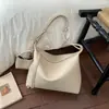 Bolsas Retro Melanoides para Mujer 2026 Nuevo Pequeño Nicho Gran Capacidad Bolso de Mano para Viajes Diarios Bolso Cruzado de Hombro Único Simple