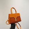 Bolsa feminina 2025 Nova moda Bolsa feminina portátil Outono e inverno Estilo ocidental Retro Simples Commuter Crossbody Trabalho Pequena bolsa quadrada