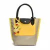 Bolso de Mano Nuevo Tipo Cubo Moda 2025 Primavera y Verano Nicho Elegante Casual Simple Bolso de Hombro Bolso Cruzado de Alto Gama con Contraste de Color