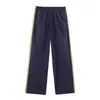 Conjunto casual de pantalón y chaqueta con cremallera estilo europeo y americano, patchwork de tejido técnico, con franjas laterales y pantalón de nailon