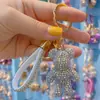 Net vermelho diamante violento urso carro controle remoto corrente anel cordão chaveiro pingente personalidade casal saco pendurado atacado