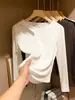 Camiseta Base Hueca de Manga Larga para Mujer Primavera/Otoño 2026, Cuello Redondo Negro, Corte Ajustado, Elegante Camiseta Superior de Estilo Americano Única