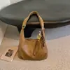 Bolsa Grande Capacidade Feminina Outono 2026 Nova Bolsa de Ombro Único de Alto Valor Bolsa Tote Cor Sólida Retro Relaxada Fashion