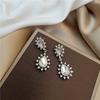 Pendientes de gota de lujo ligero y de alta gama, pendientes retro versátiles para mujer