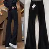 Jeans de mezclilla suave Cleanfit negros y grises ligeramente acampanados para hombre, pantalones con vibra de la alta calle americana, pantalones rectos ajustados con corte curvo