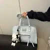 Bolsa de Ombro de Grande Capacidade para Mulheres 2025 Nova Moda Primavera e Verão Versátil Estilo Bolsa Bowling Estilo Estrangeiro Bolsa Tote