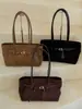 Bolso de mano de nicho muy elegante y casual estilo coreano, nuevo 2026 vintage color liso bolso relajado para el hombro y debajo del brazo