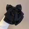 Vista frontal puede ver ~ accesorios para el cabello de lazo negro grande pinza de pelo elegante francesa clip de agarre para coleta alta en la parte posterior de la cabeza mujeres ins