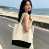 Bolso de Hombro Tejido Hueco de Verano para Mujer 2025 Nuevo Estilo Bolso de Punto con Flor de Hilo Gran Capacidad Bolso Tote