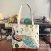 Bolsa de ombro estilo novo para sofá com fio dourado e estampa floral, bolsa tote de grande capacidade, bolsa de lona, bolsa de mão para compras, branca com zíper único