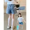 Shorts Jeans Femininos Infantil Verão 2025 Novo Calça Cinco Pontos para Crianças Mais Velhas Casual Moderno Estiloso Atacado