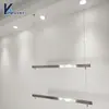 Estante de Exhibición para Tienda de Ropa Montado en Pared Acero Inoxidable Cepillado Colgador Tubo Cuadrado Barra para Ropa Exhibición de Ropa para Mujer Estante Colgante de Techo