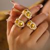 Anillo nuevo geométrico de cono de diamante transfronterizo de Europa y Estados Unidos, moda, diseño simple, acero de titanio chapado en oro de 18k, joyería