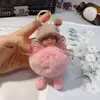 Lindo suave llavero de muñeca linda creativo accesorios de flor eterna de piel de conejo Rex colgante para bolsa de coche pequeño regalo al por mayor