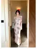 Vestido largo elegante vintage francés morado floral estilo Hong Kong impresionante nuevo vestido de malla estampada otoño 2026