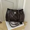 Bolso de cadena con rombos para mujer 2026 nuevo otoño alta gama retro lujo ligero para el día a día bolso de hombro único bolso cruzado tipo cubo