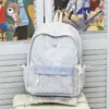 Mochila de estilo casual y simple para estudiantes mujeres, gran capacidad, ligera, versátil, mochila diaria estilo universitario 2026