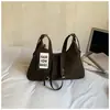 Bolso de Axila Retro de Nicho para Mujer 2026 Primavera Nuevo Bolso Tote de Moda Bolso Cruzado de Gran Capacidad Simple Bolso de Viaje