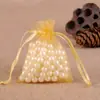 Bolsa de hilo para joyería al por mayor de fábrica color liso hilo de perla bolsa para dulces de boda empaque de joyería color liso bolsa de malla de gasa organza