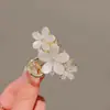Pinza de flor de ópalo mediana 2023 Nuevo elegante pinza para coleta media pinza para el pelo pinza de tiburón femenina tocado