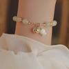 Pulsera de Campana Pequeña Continuada de Jade Hetian Natural Diseño Nicho de Lujo Ligero Elegante Combinable Pulsera para Novia para Mujer en Verano