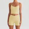Conjunto de Sutiã Esportivo de Manga Curta com Gola Halter e Bolso para Corrida e Yoga Calça Longa e Curta para Mulheres