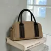 Bolso de mano retro estilo Boston con forma de concha para mujer, nueva colección 2025, moda transfronteriza de tendencia, bolso de hombro de gamuza