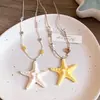 Collar Largo de Estrella de Mar para Mujer Estilo Vacaciones en la Costa Sensación de Alta Gama Cadena para Suéter Nuevo Estilo 2025 Accesorio para Colgar en el Cuello
