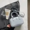 Bolsa Transfronteiriça 2026 Novo Design de Nicho Padrão Lichia Estilosa Versátil Simples para o Dia a Dia Transversal Feminina