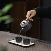 Juego de té de arcilla púrpura para el hogar, que incluye una tetera y cuatro tazas, un juego de regalo de alta gama para uso doméstico, adecuado para ocasiones de negocios y se puede personalizar con un logotipo